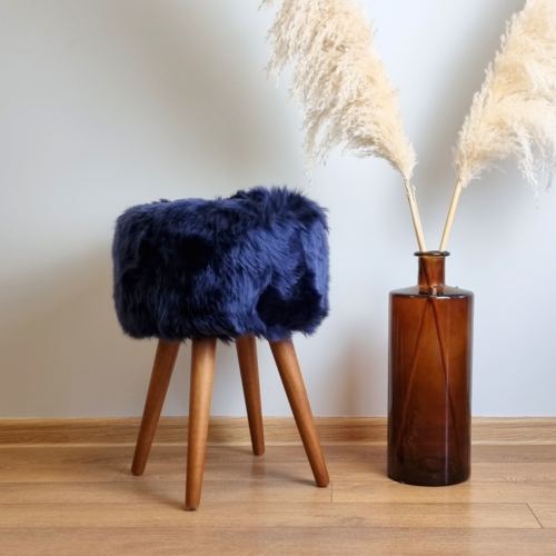 Dark blue genuine sheepskin stool with oak legs